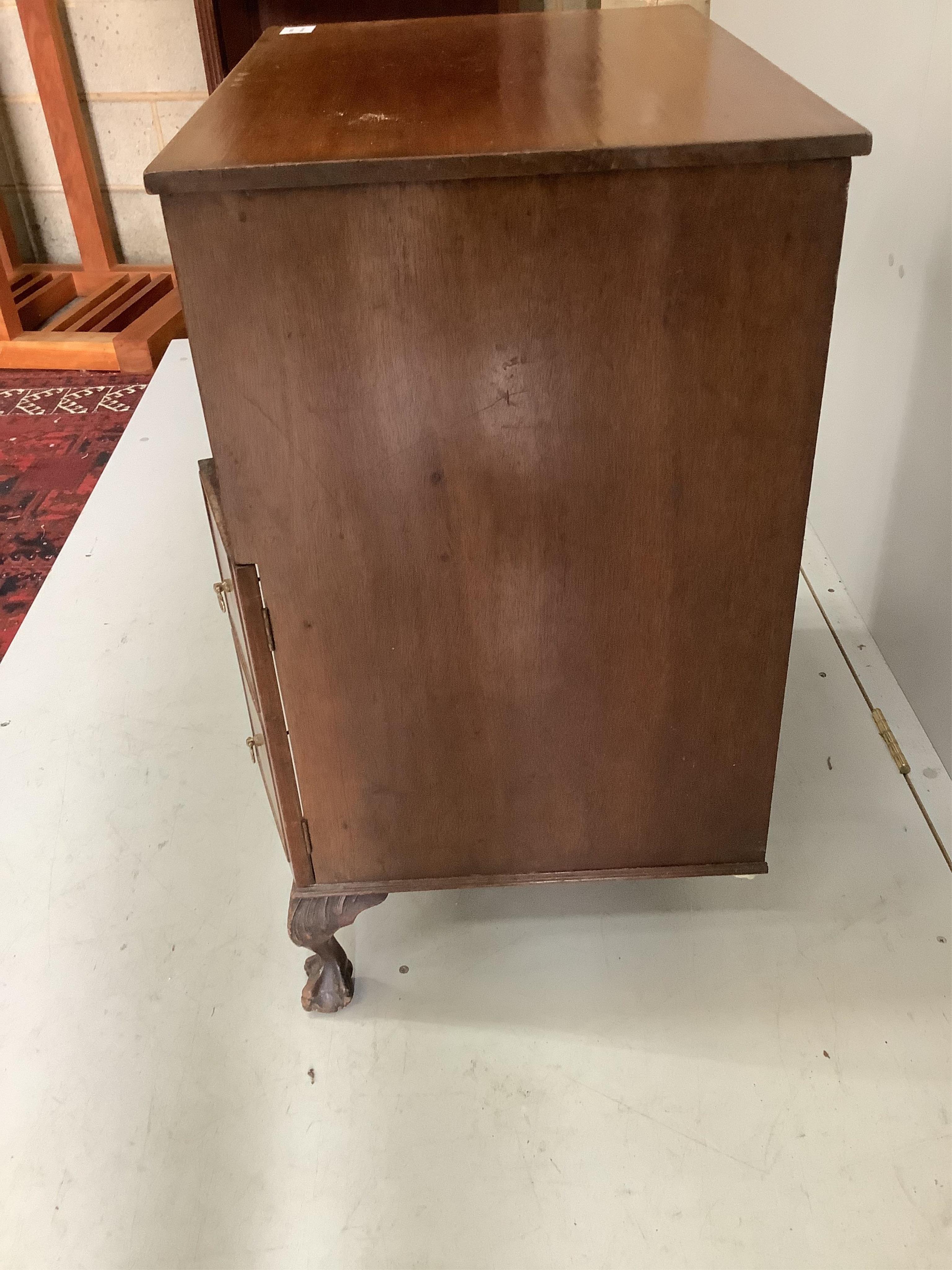 A small George III style mahogany kneehole desk, width 61cm, depth 43cm, height 77cm. Condition - poor to fair